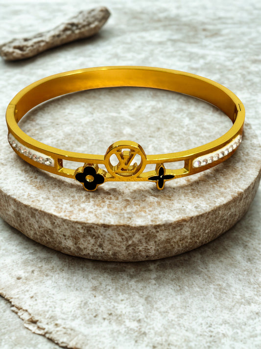 Designer Gold-Tone Bangle with Black Floral Accents